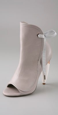 omelle_open_toe_apron_pumps