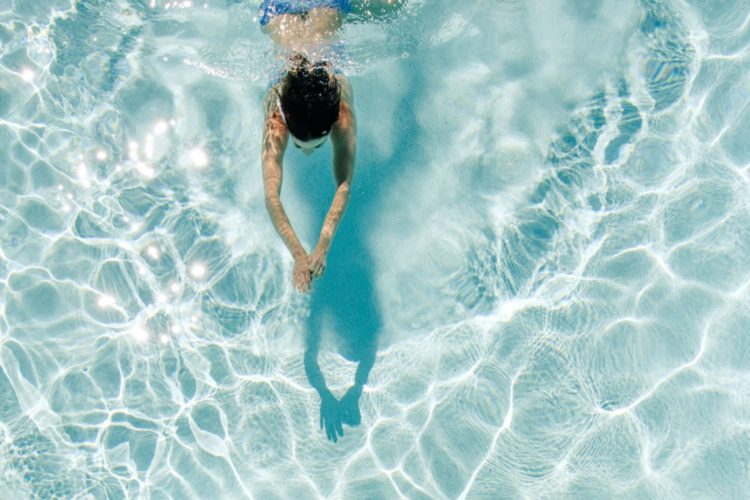 IndigoPool_BirdsEye_Woman_Swimming_July2015_2000x1333