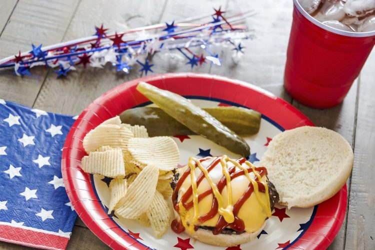 Cheeseburger with ketchup and mustard and a patriotic theme